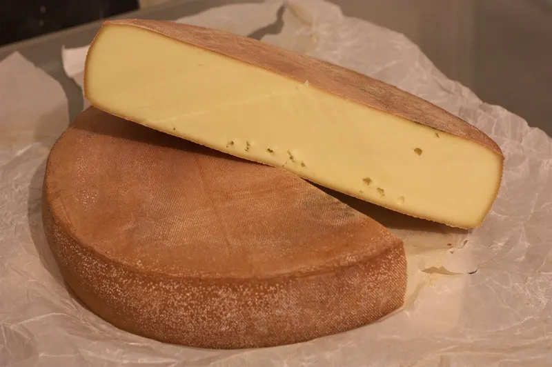 Rustic artisan cheese wheels